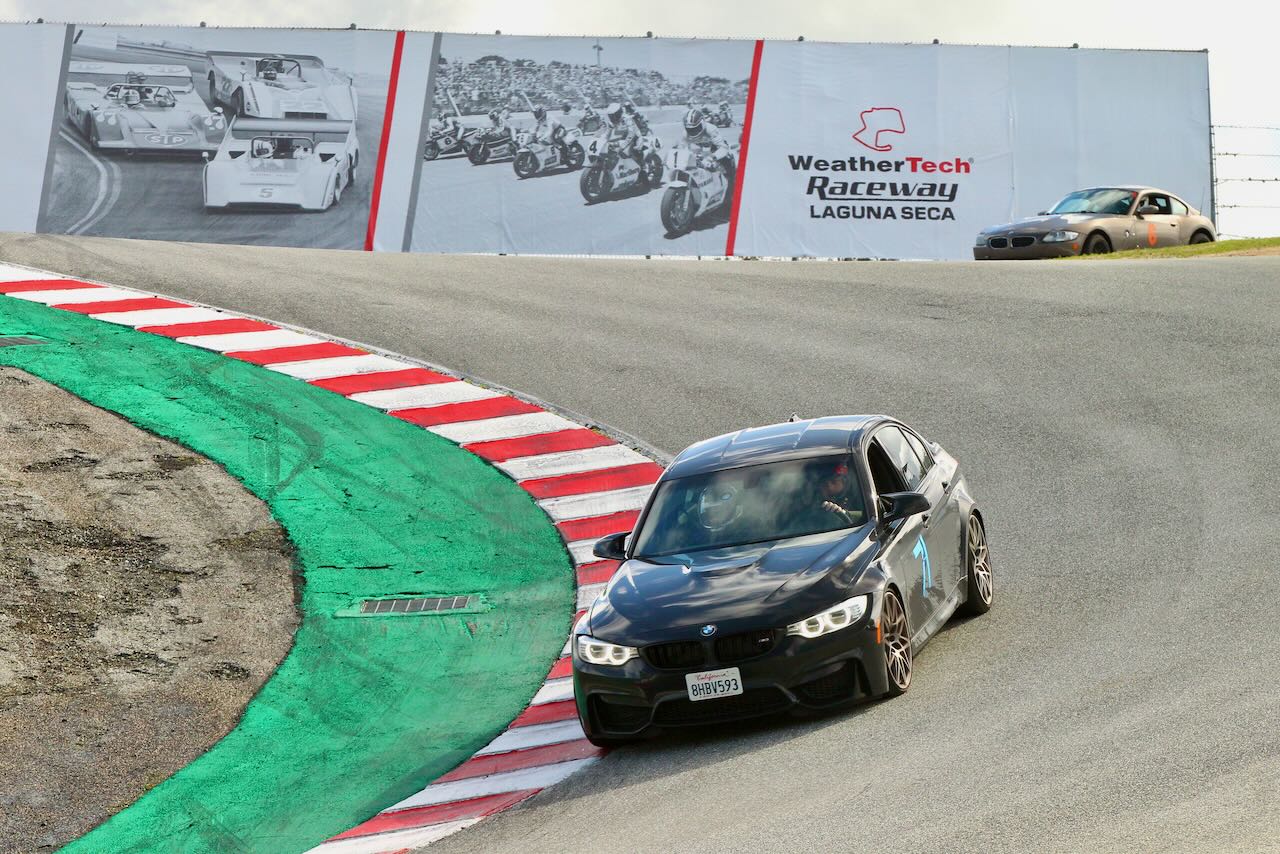 An F80 M3 navigates the cork-screw at Laguna Seca Raceway